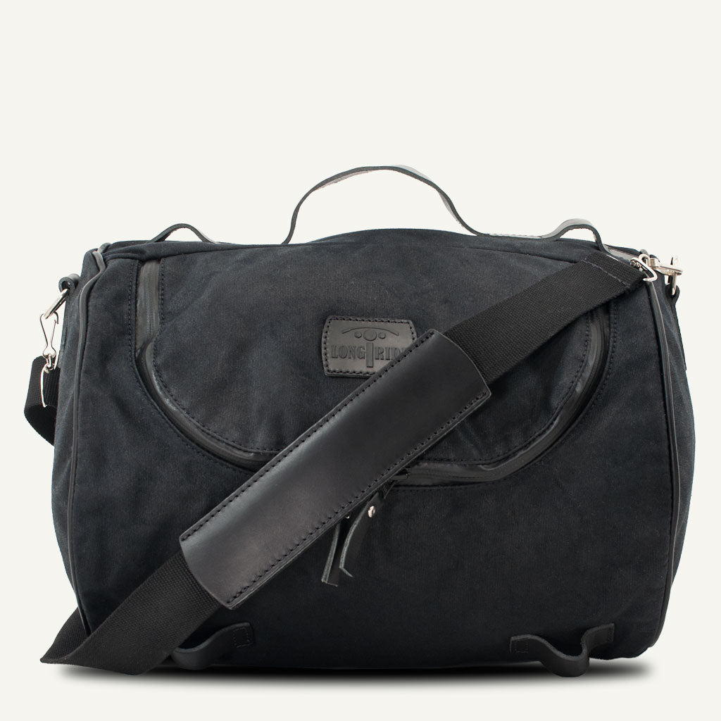 Belle sacoche de selle retro pour moto noir.